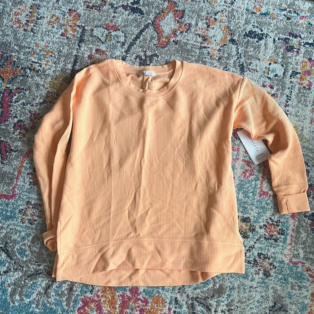 Medium light orange Athleta waffle knot top